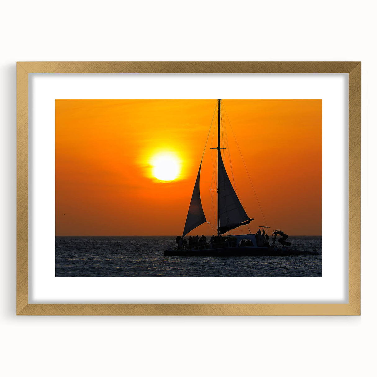Abstract art print of Caribbean Aruba scenery in a gold frame with mat, featuring vibrant blue and green tones.