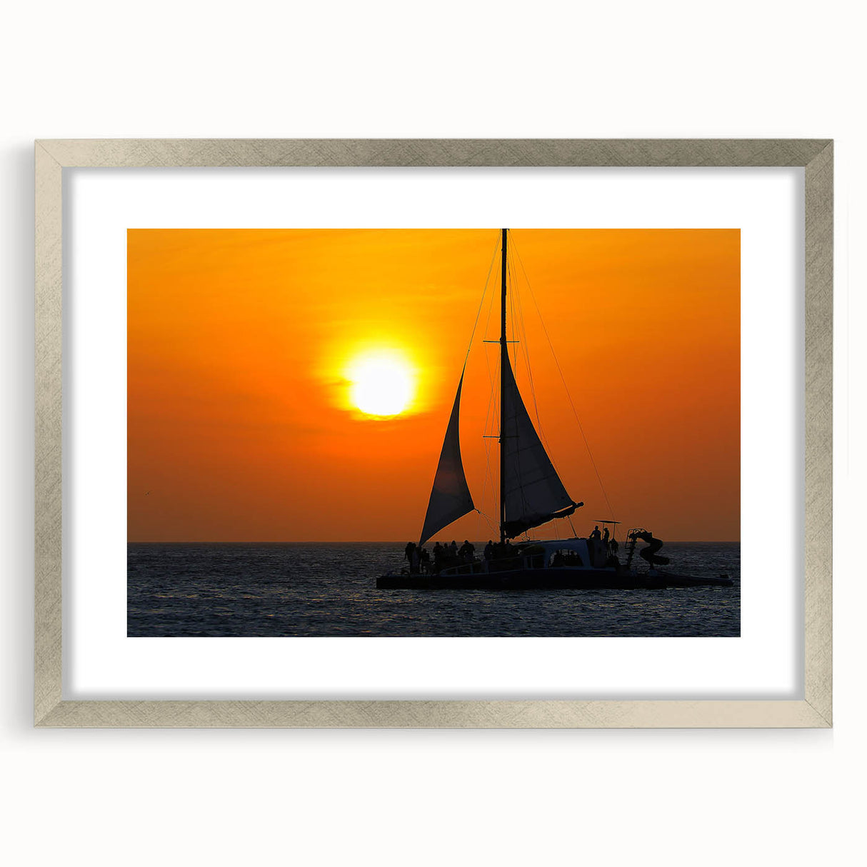 Extra large abstract art print of a Caribbean scenery in silver frame, featuring textured blue and white tones.