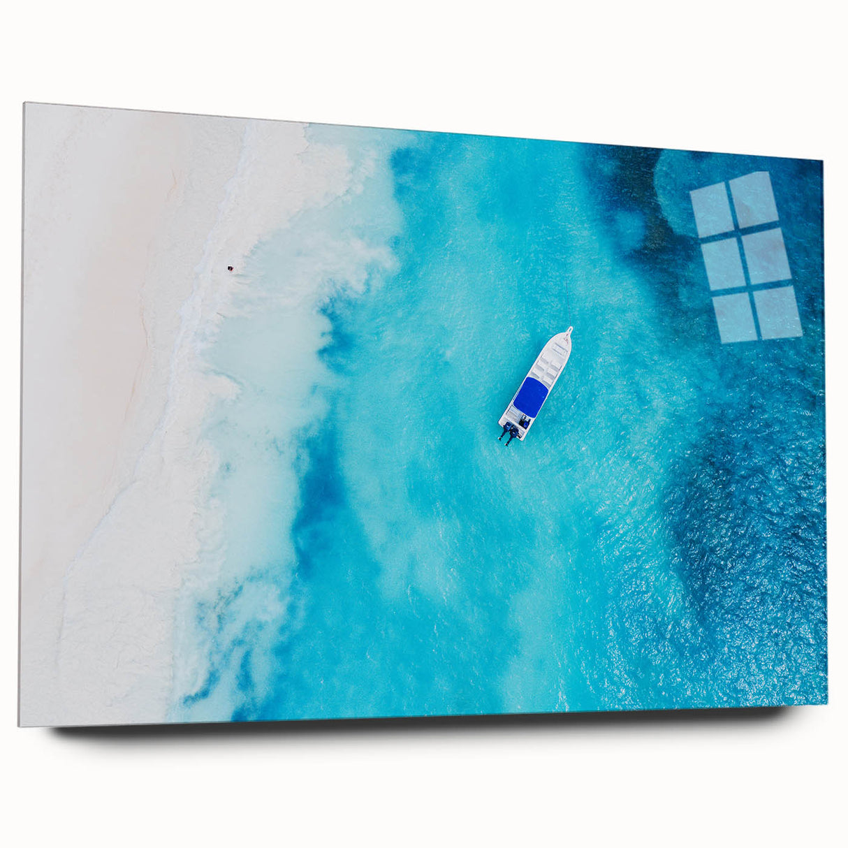 Large abstract wall art of a Caribbean scene in vibrant blue and green tones on acrylic glass.