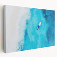 Large art print of a Caribbean beach scene with vivid blue and turquoise waters on stretched canvas.