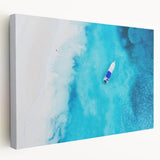 Large art print of a Caribbean beach scene with vivid blue and turquoise waters on stretched canvas.