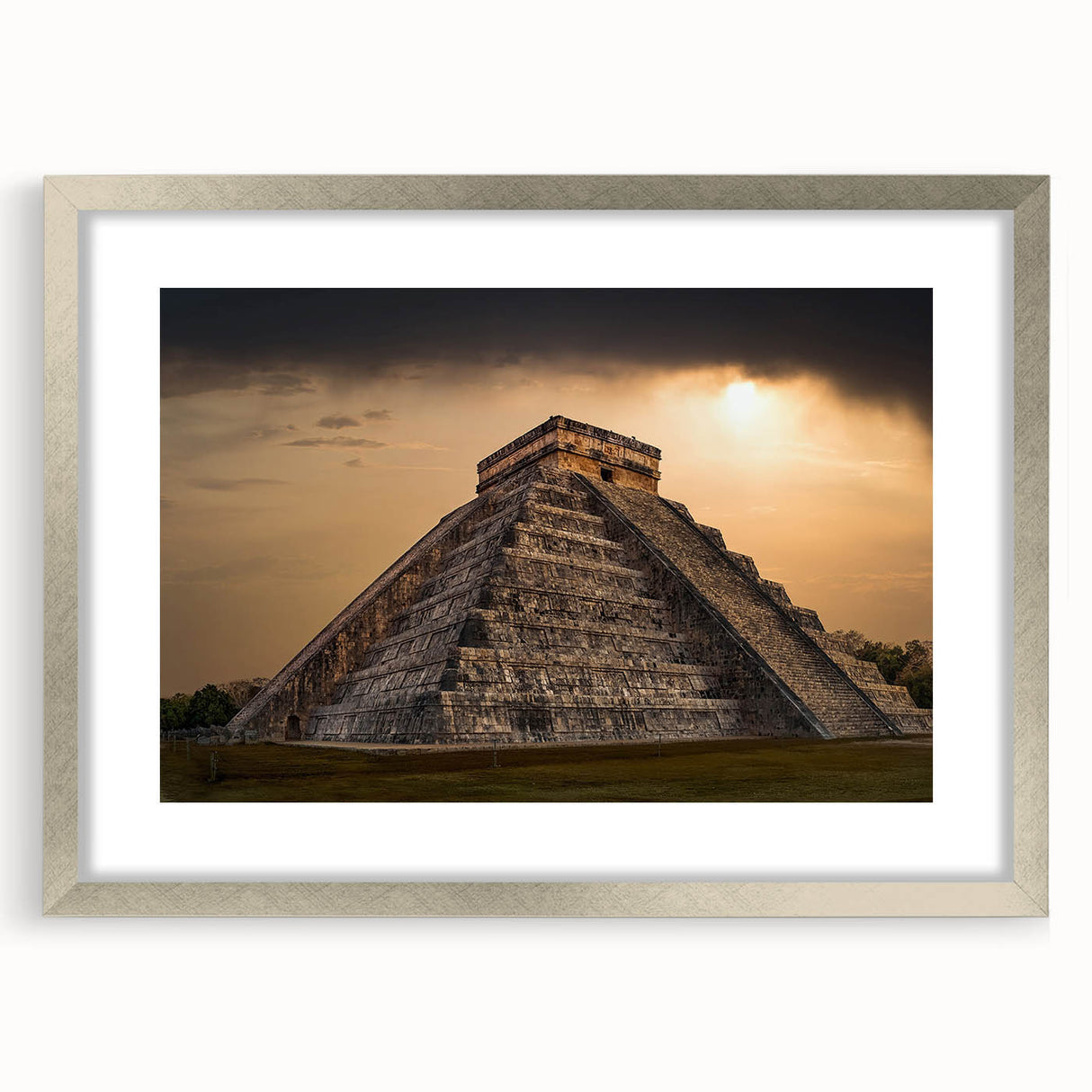 Textured abstract art print depicting a Central American scenery in muted earth tones, framed in silver.
