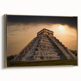 Framed canvas wall art featuring a vintage-style landscape painting of Central America with muted gold and black tones.