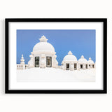 Extra large, colorful art print depicting an abstract Central American scenery in vibrant hues on a black framed canvas.