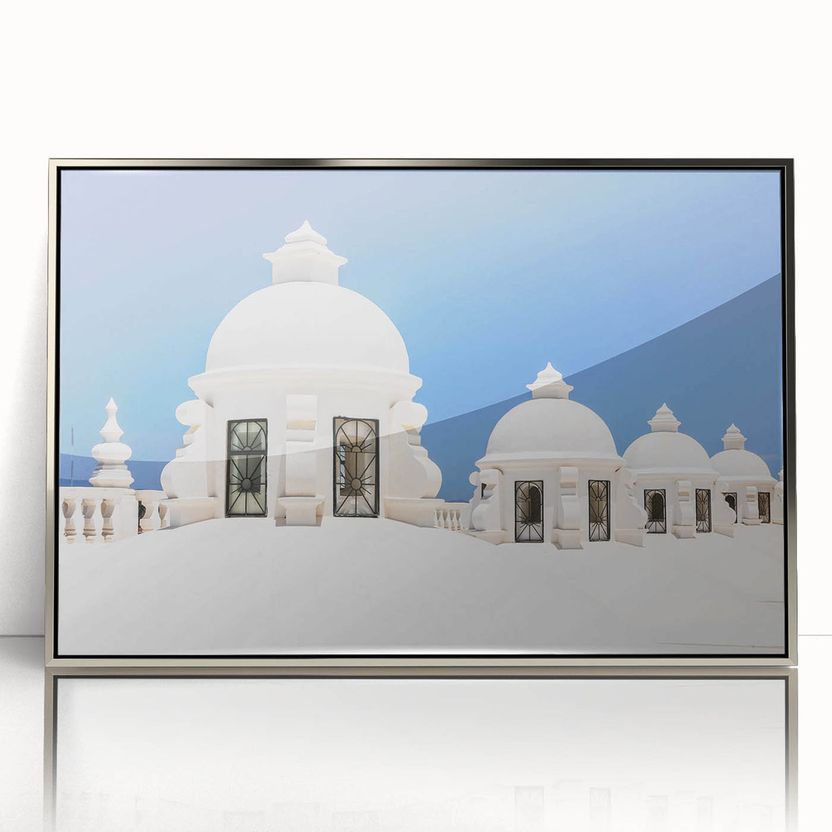 Mid-century modernist art depicting a serene Central American landscape in muted greens and blues, framed in silver acrylic.