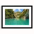 Extra large abstract art print depicting a vibrant, colorful Albanian landscape on a textured canvas, framed in black.