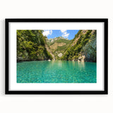 Extra large abstract art print depicting a vibrant, colorful Albanian landscape on a textured canvas, framed in black.