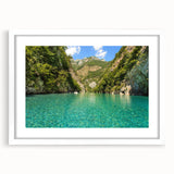 Abstract art print depicting a European Albanian landscape in muted earth tones on a framed white mat.