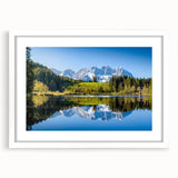 Textured abstract art print depicting a European landscape in muted earth tones, framed in white, suitable for bedroom decor.