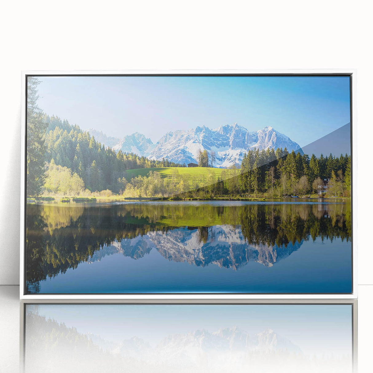 Mid-century modernist art depicting a serene Austrian landscape, with muted green and blue tones on a framed acrylic panel.