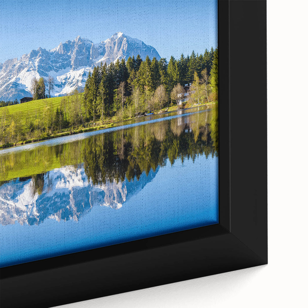Extra large framed canvas featuring a textured depiction of a European Austrian landscape in black with colorful art accents.