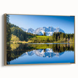 Framed canvas featuring a vintage-style landscape painting of an Austrian scenery in muted earth tones.