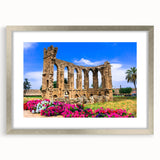 Extra large abstract art print of a textured European landscape in muted earth tones, framed in silver.