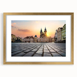 Abstract art print of Prague scenery in muted gold and blue tones, framed with a gold mat.