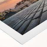 Art deco poster of Prague skyline in muted blue tones on rolled canvas, suitable for dining room decor.