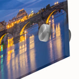 Large abstract wall art of a European cityscape in muted earth tones on acrylic glass, suitable for dining room ambiance.