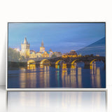 Mid-century modernist art depicting the Prague skyline in muted earth tones on a framed acrylic panel.