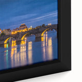 Extra large framed canvas of a textured Prague skyline in black with colorful accents, ideal for living room decor.