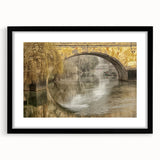 Colorful abstract art print depicting a European scenery in vibrant hues, framed in black, ideal for living room ambiance.
