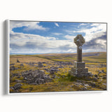 Vintage poster art of Cumbria's landscape on a framed canvas, featuring vibrant greens and blues.