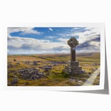 Scenic Cumbria landscape print on rolled canvas, featuring lush greenery and a distant village, suited for dining room decor.