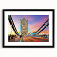 Colorful abstract art print of London scenery in vibrant hues, framed in black, ideal for living room decor.