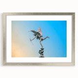 Extra large abstract art print of Piccadilly, England in textured shades of gray and blue, framed in silver.