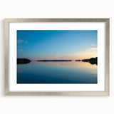 Textured abstract art print depicting a serene Finnish landscape in cool blue and gray tones, framed in silver.