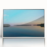 Mid-century modernist art depicting a serene Finnish landscape in muted blue and green tones, framed acrylic.