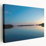 Landscape painting of a serene Finnish lake at sunset on a large stretched canvas, ideal for kitchen wall art.