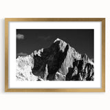 Abstract art print of the French Alps in muted earth tones on a framed canvas, suitable for dining room decor.