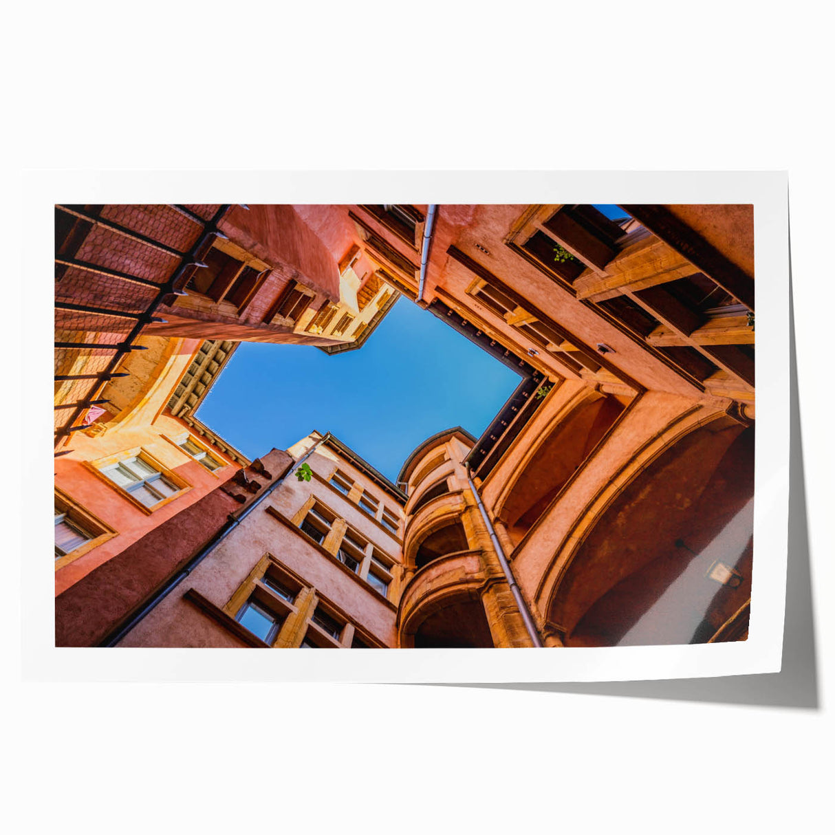 Extra large rolled print of Lyon, France, featuring detailed floral designs in soft pastel colors.