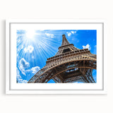 Textured art print of an abstract Paris skyline in muted grays and blues on a framed white mat, suited for bedroom decor.