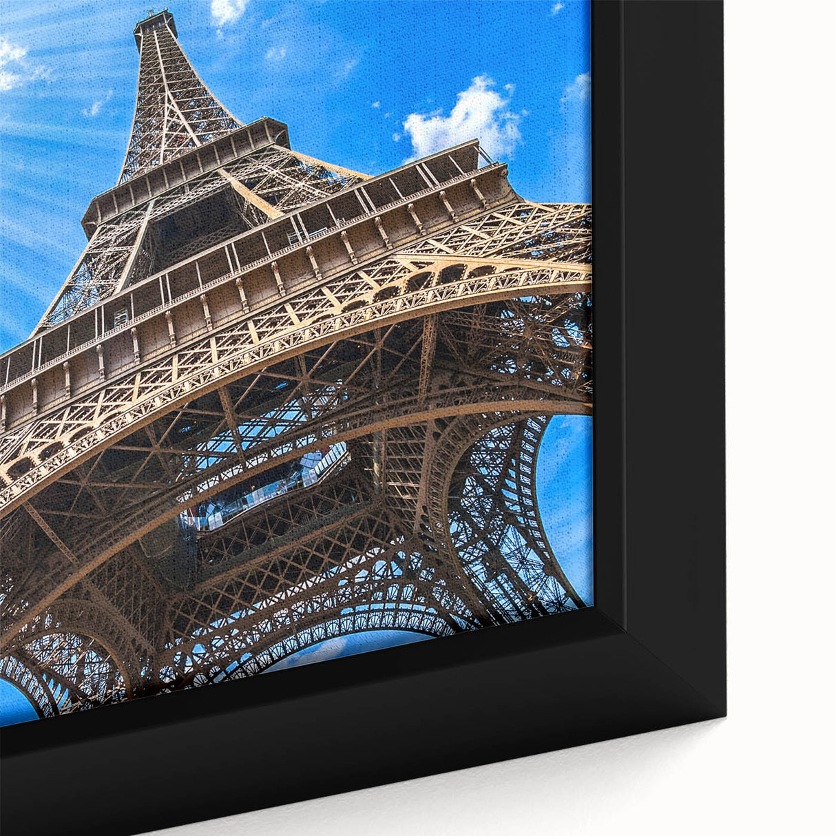 Black framed canvas of a textured Parisian street scene in colorful art style, ideal for living room decor.