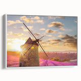 Vintage poster art of a Provencal landscape on a framed canvas, featuring colorful art in pastel shades.