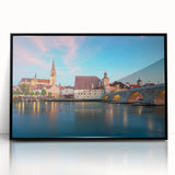 Large abstract wall art featuring a stylized Bavarian landscape in muted earth tones, framed in black acrylic.