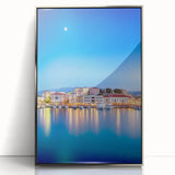 Mid-century modernist art of Crete scenery in muted blue and white tones on a silver-framed acrylic print.