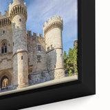 Black wall art featuring a textured close-up of Rhodes, Greece in vibrant colors on a framed canvas.