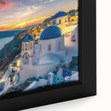 Close-up of extra large framed canvas depicting a textured, colorful Santorini scene on black background.