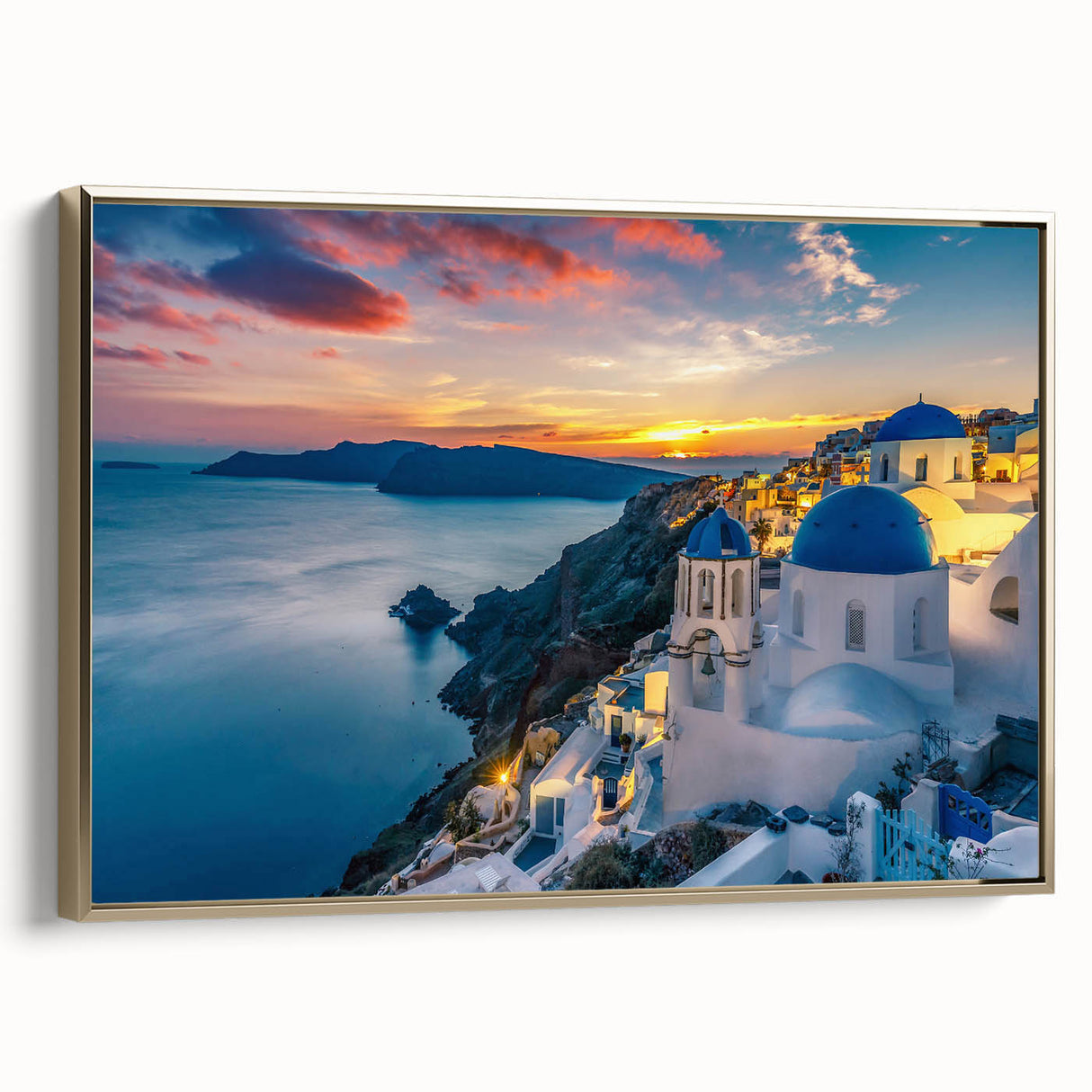 Framed canvas depicting a vintage-style landscape of Santorini with a black and gold color palette.