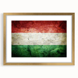 Abstract art print of a European scenery in muted green and gold tones, framed with a gold mat.