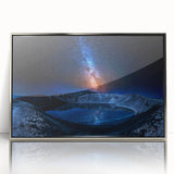 Large art print of a serene Icelandic landscape with muted green and blue tones on a framed acrylic.