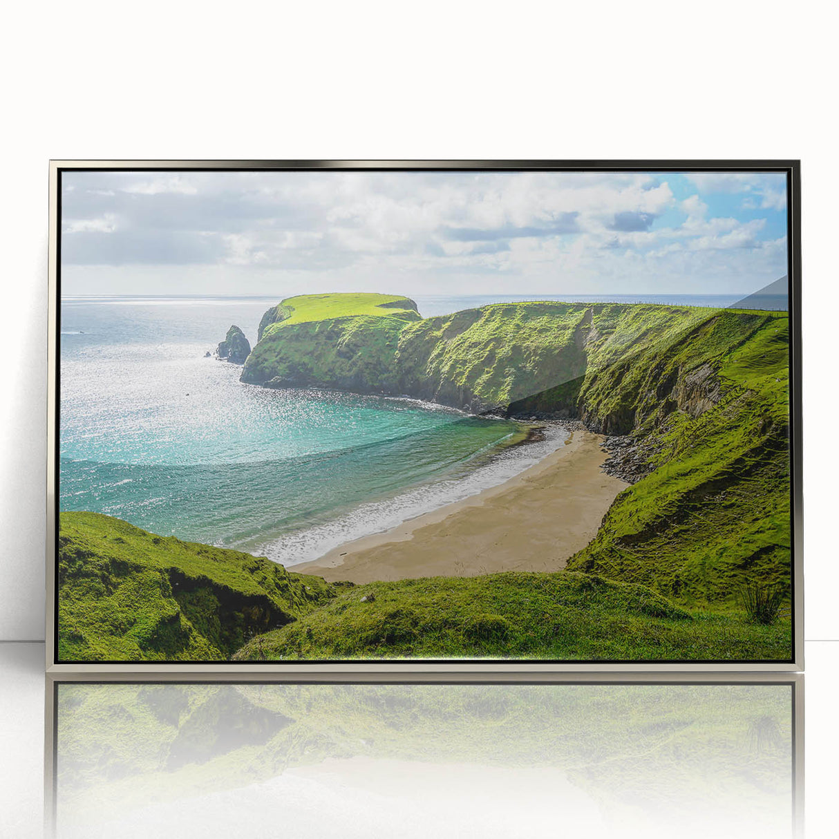 Large art print of a scenic Irish landscape in muted green and blue tones, framed in silver acrylic.