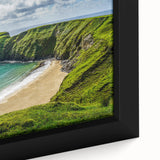Close-up of a textured, black wall art featuring a colorful Irish landscape on a framed canvas, ideal for living room decor.