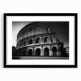 Abstract art print of the Colosseum in vibrant colors on a large framed canvas, ideal for living room decor.