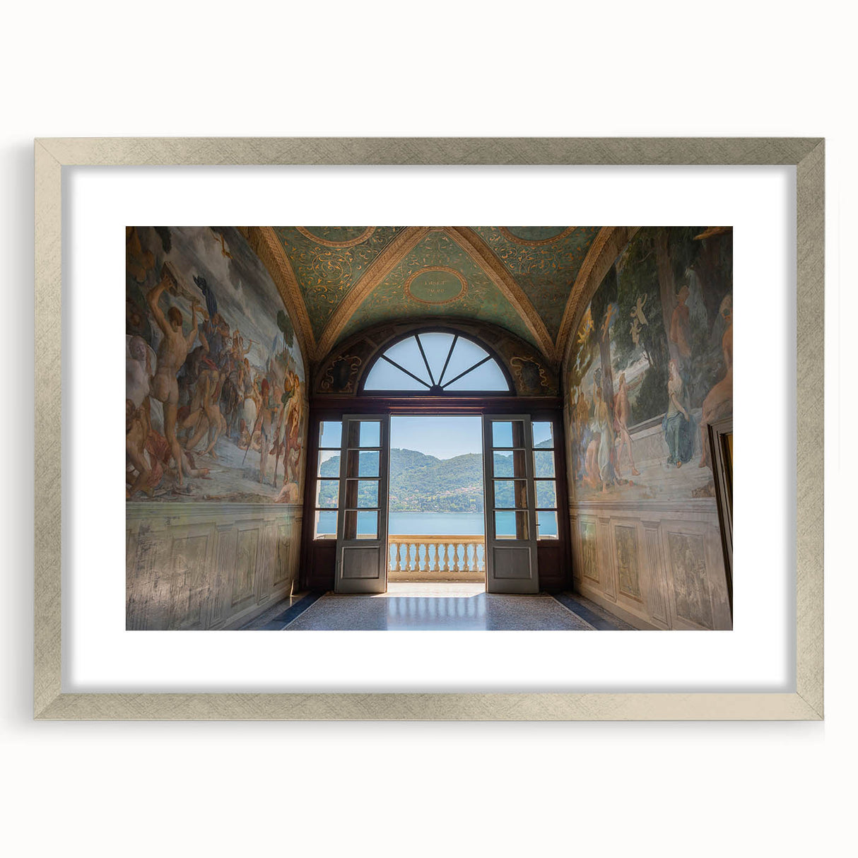 Extra large wall art of Lake Como with textured abstract prints in muted earth tones, framed in silver.