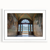 Textured art of Lake Como with abstract elements in muted blues and greens, framed with a white mat, ideal for bedroom decor.
