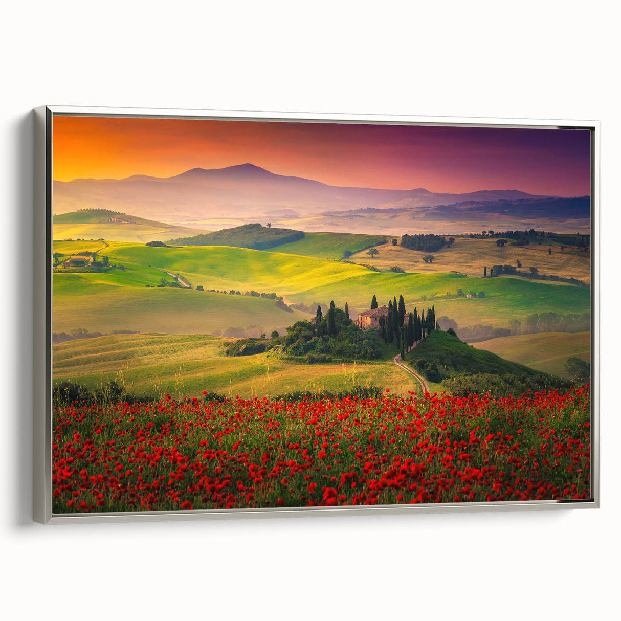 Framed canvas of a Tuscan landscape painting, featuring rolling hills and vibrant sunset colors, ideal for living room decor.
