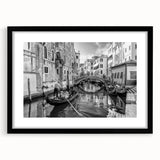 Extra large, colorful abstract art print of a Venice scenery in a black frame, ideal for living room decor.