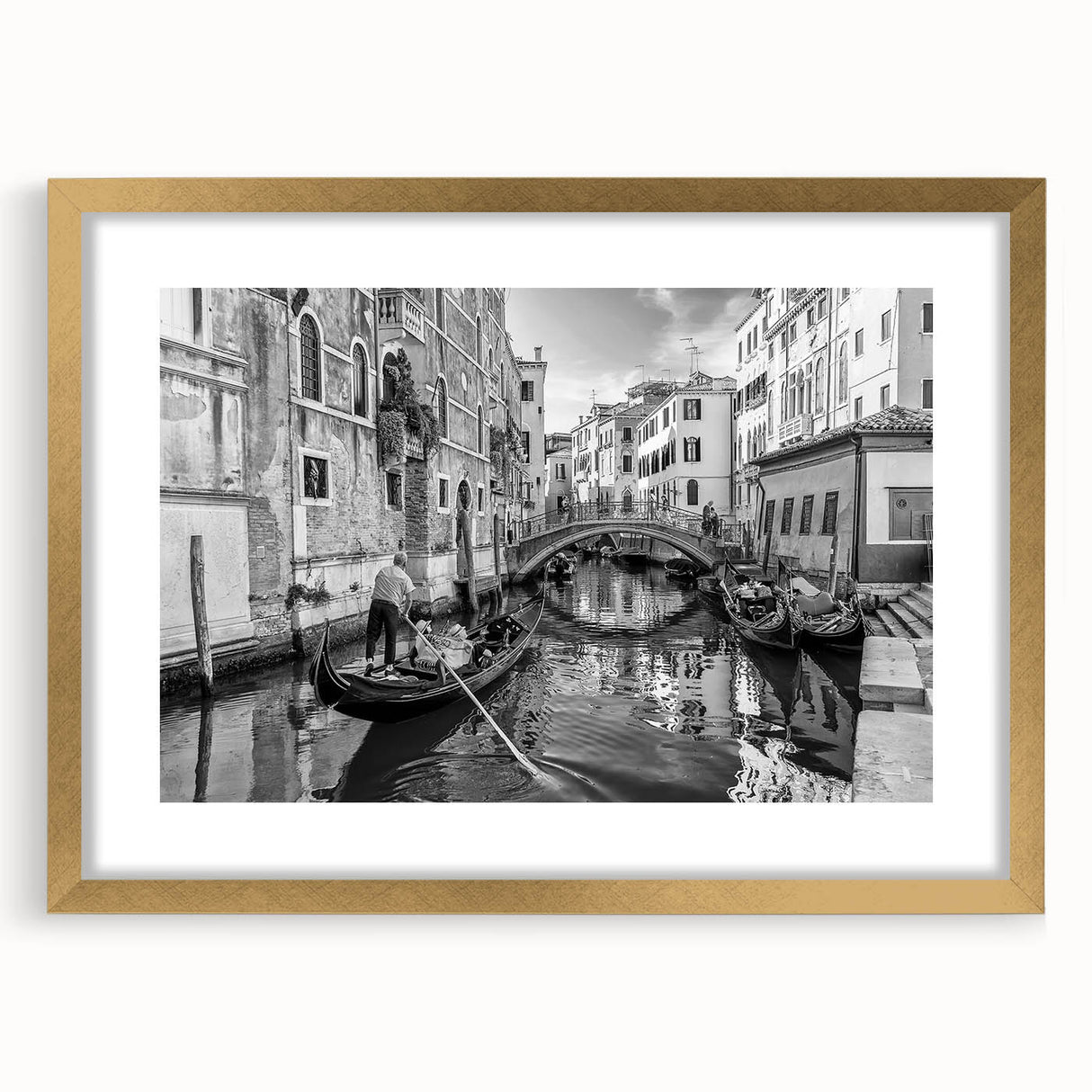 Abstract art print of a Venetian scene in muted gold and blue tones on a framed canvas, suitable for dining room decor.